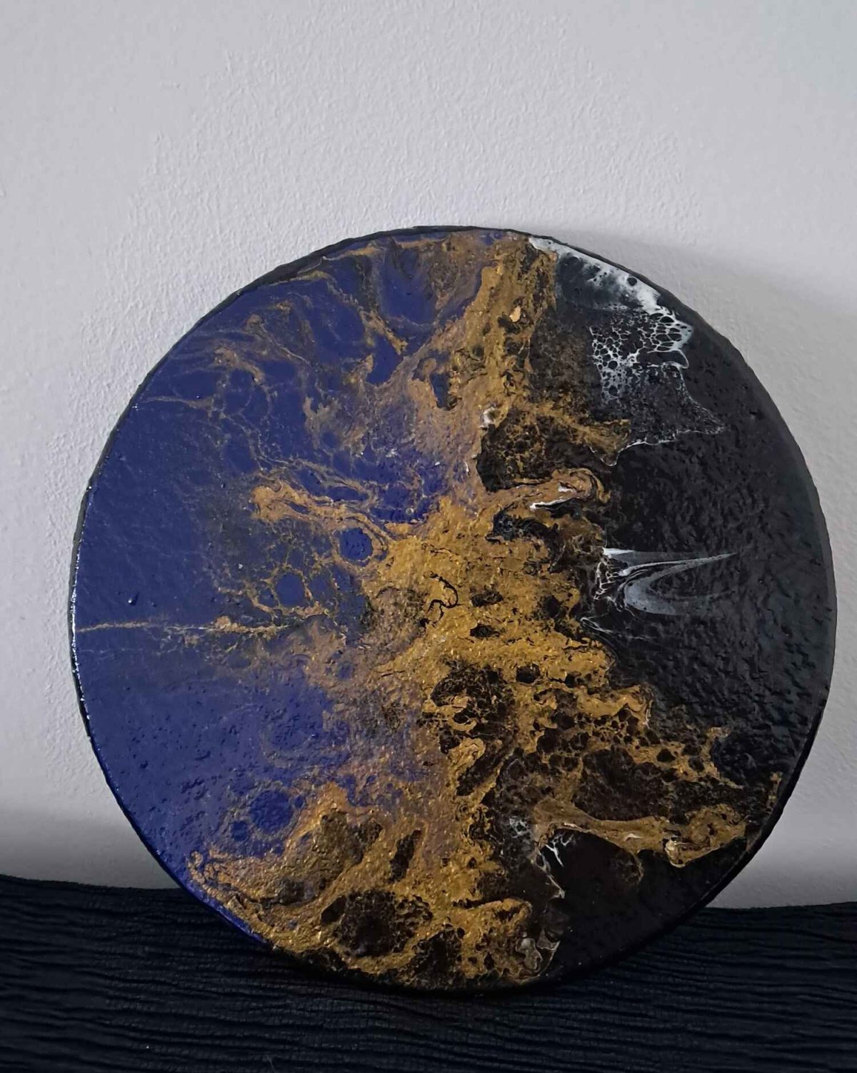 Tableaux ronds sur liège – La magie du sèche-cheveux .